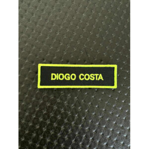 NOME BORDADO DE VELCRO C/ MEDIDAS 10CM X 3CM C/REBORDO