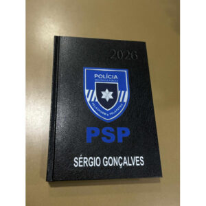 AGENDA 2026 TAMANHO A5 COM EMBLEMA DA PSP E NOME