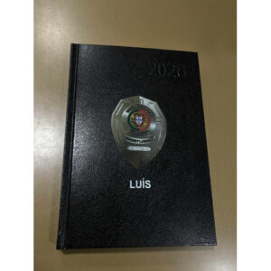 AGENDA PRETA 2026 TAMANHO A5 C/ EMBLEMA NORMAL DE SEGURANÇA E NOME